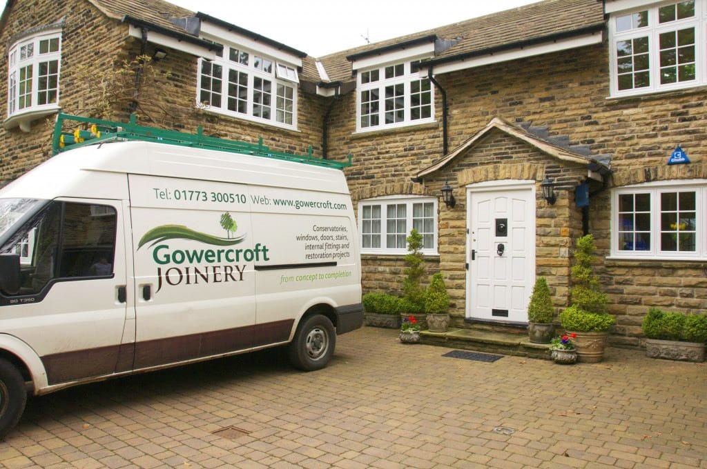 The gowercroft window fitting team outside a home