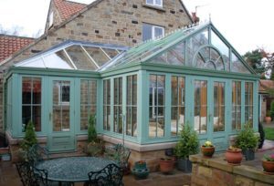 Garden room with farrow and ball painted hardwood conservatory