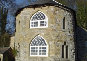 Gothic wooden heritage windows built by Gowercroft fitted to an imposing grade II listed building
