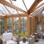 garden room with wooden conservatory and casement windows