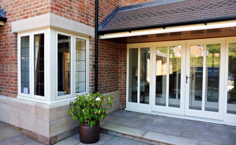 Hardwick casement windows corner bay post square lead painted strutt yellow Melbourne french doors side lights attached top bottom rails brick building