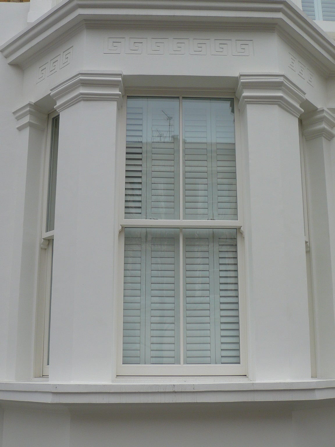 Victorian Chatsworth sliding sash window spiral painted white stone bay