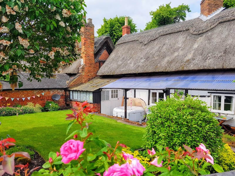 Richmond casement windows in thatched cottage teachers lodgings part of Repton School in Derby