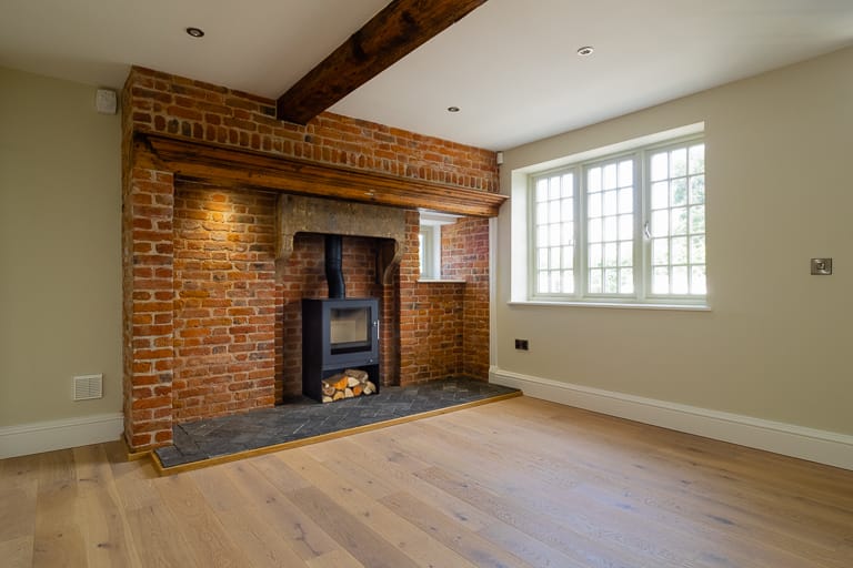 Melbourne arms restored fireplace with traditional georgian casement window