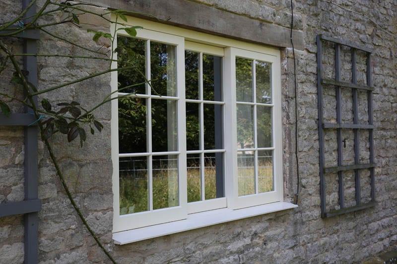Belton horizontal sash window in heritage project installation by Gowercroft Joinery from left