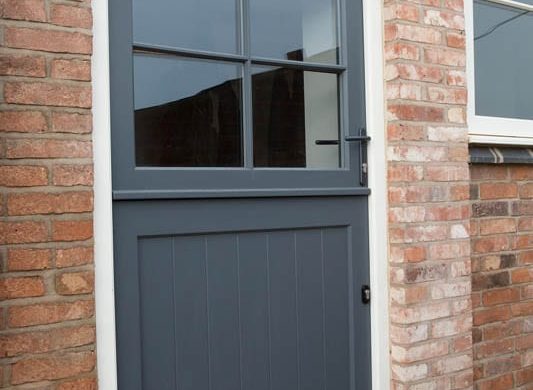 Melbourne stable door Stephenson leaf white frame painted panel bottom groove brick external view close up