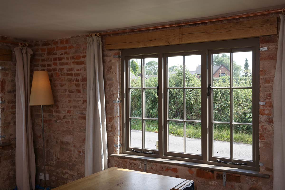 Traditional casement timber windows in a Surrey farm house