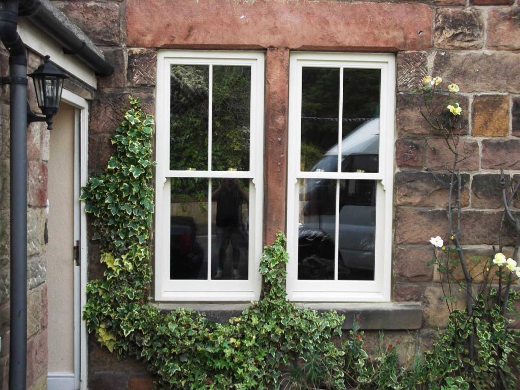 Double glazed sash windows installed in a traditional farm house