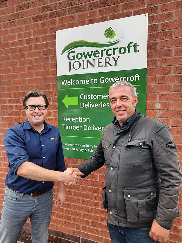 New Partnerships Manager Peter Buckley is welcomed on boa rd by Gowercroft Joinery?s H ead of Sales, Joe Grimley