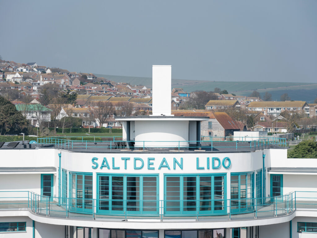 Tutbury Bi-Fold Doors and Melbourne French Doors (Curved Rotunda Exterior View)
A detailed shot of the curved rotunda at Saltdean Lido, featuring the turquoise Tutbury Bi-Fold Doors and Melbourne French Doors. The elegant curvature and period-inspired design maintain the historic integrity of the restored building.